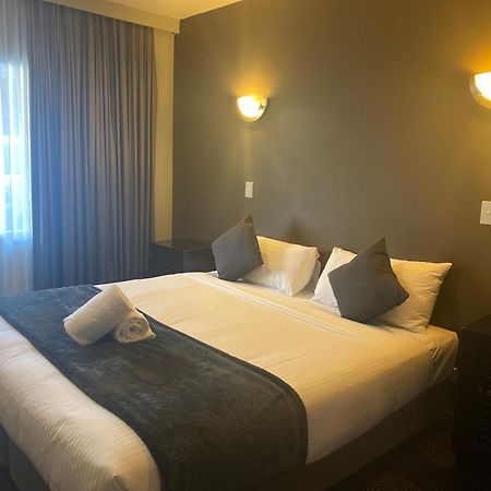 غولبورن The Astor Hotel Motel الغرفة الصورة