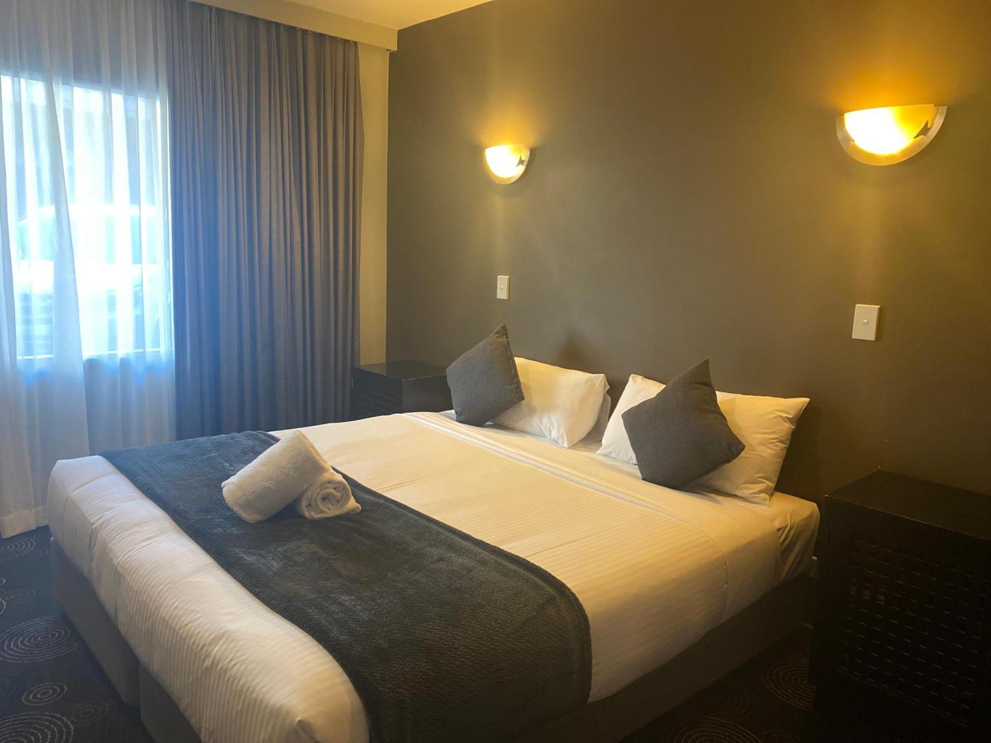 غولبورن The Astor Hotel Motel الغرفة الصورة
